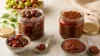Whole-fruit and paste-style boroi achar in two unbranded glass jars with clean dry spoons