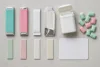 Unbranded gum stick packs, individual sticks, pellets and a blank count card arranged for comparison