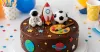 Chocolate birthday cake with space, football and art theme options
