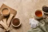 Unbranded coffee sachets, granules, tea bags and prepared cups arranged for a format comparison